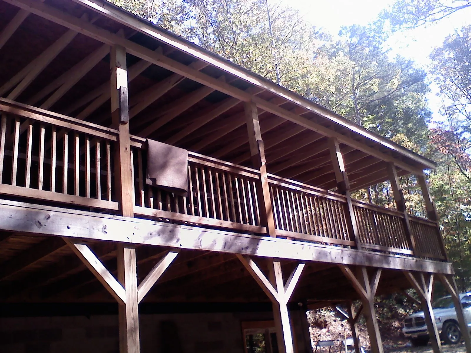 Timber framing under a new elevated porch and deck — Roof Leak Repair in South Glastonbury by Roofing Brothers